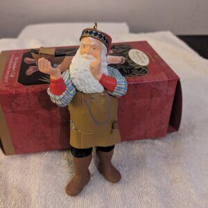 Santa Ornament holding a Boat